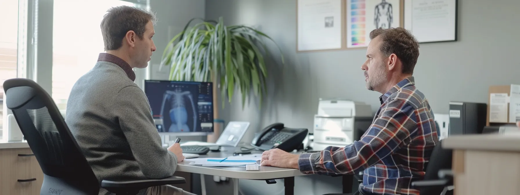 a patient sitting across from a chiropractor in a modern office, attentively listening as the chiropractor explains treatment options and plans.