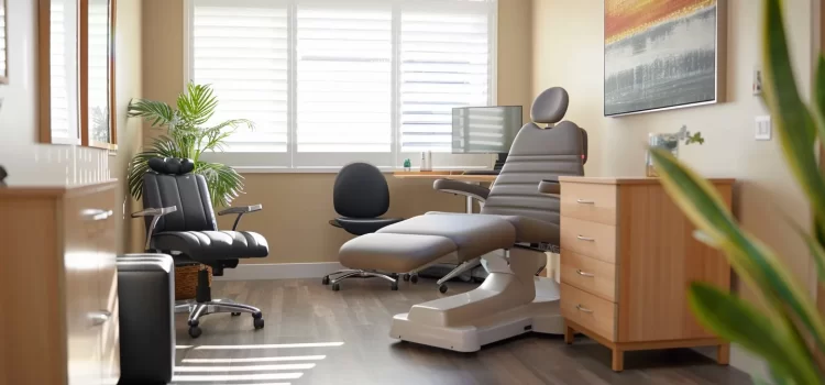 a serene chiropractic clinic in cochrane with a knowledgeable practitioner examining a patient's hip-related issues.