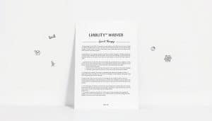 A crisp, high-resolution image of a neatly organized liability waiver document for sports therapy services, set against a clean, professional backdrop. The waiver form is positioned centrally, with its title and key legal sections clearly visible. Surrounding the document are subtle design elements that evoke the concepts of wellness, rehabilitation, and client-therapist trust, such as simple line art icons of exercise equipment, human silhouettes, and a light, muted color palette. The lighting is soft and even, creating a sense of clarity and attention to detail. The overall composition conveys the importance of thorough, transparent legal agreements in the context of providing safe, high-quality sports therapy.