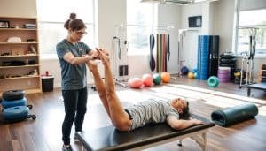 An evidence-based physiotherapy clinic in Calgary, Alberta. In the foreground, a physiotherapist demonstrating a targeted exercise routine on a patient, showcasing their expertise. In the middle ground, various rehabilitation equipment like balance boards, resistance bands, and foam rollers. The background features a clean, modern, and well-equipped treatment space with natural lighting streaming through large windows. The atmosphere conveys a sense of professionalism, care, and a commitment to helping patients recover and improve their physical well-being.
